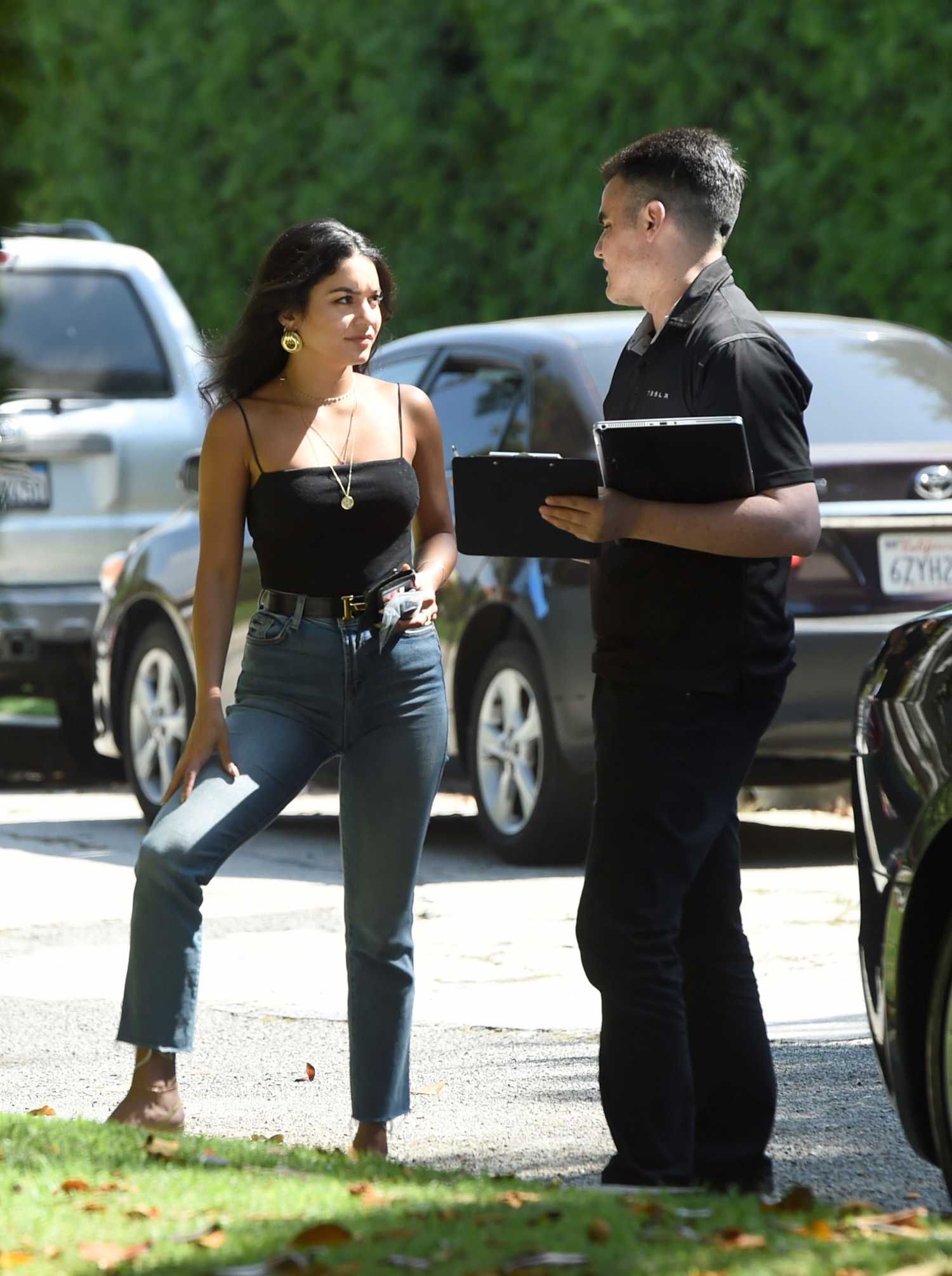 vanessa hudgens in a black top signs off on a brand new