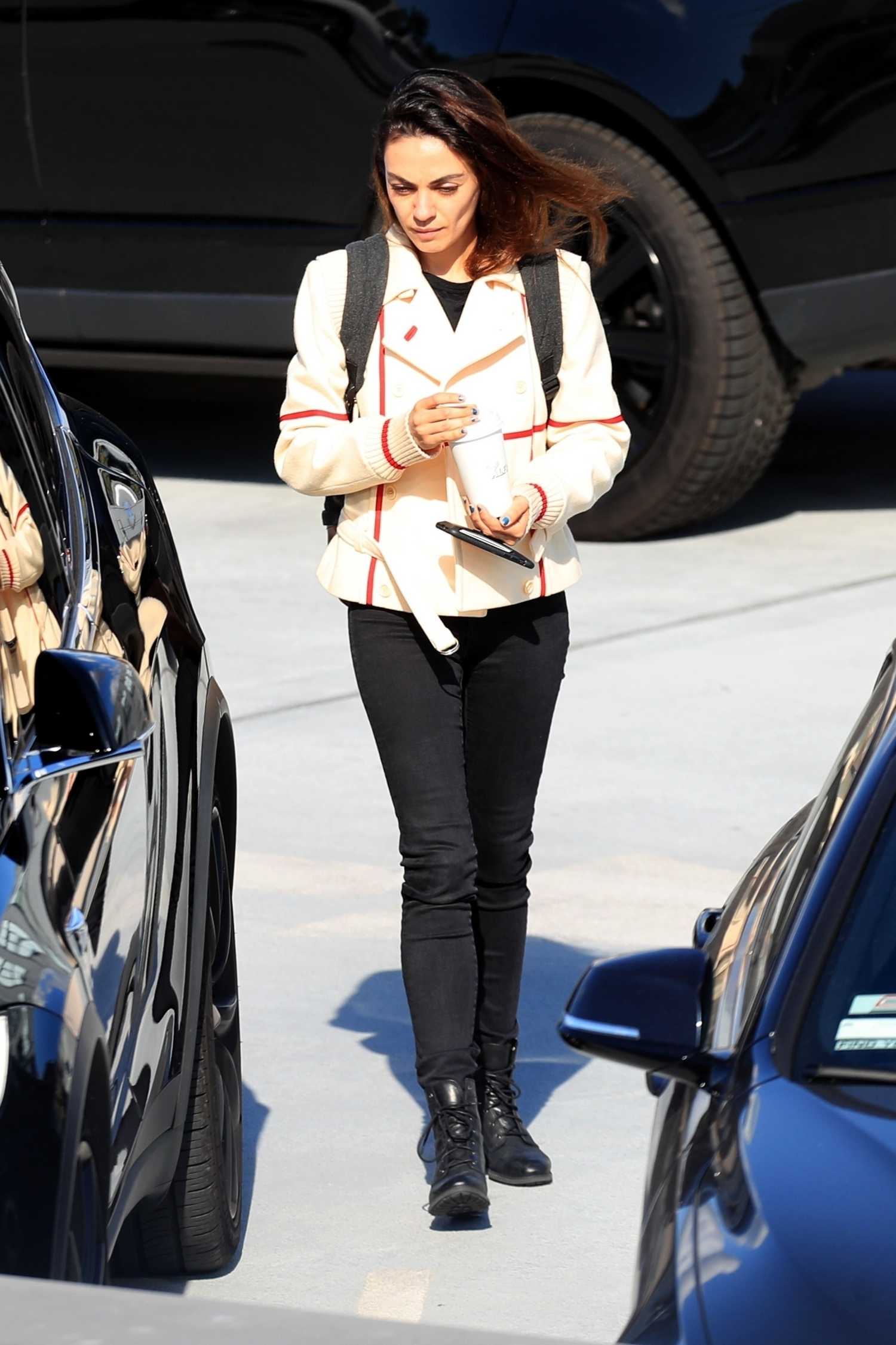 Mila Kunis in a Black Boots Heads to a Meeting in Beverly Hills – Celeb ...