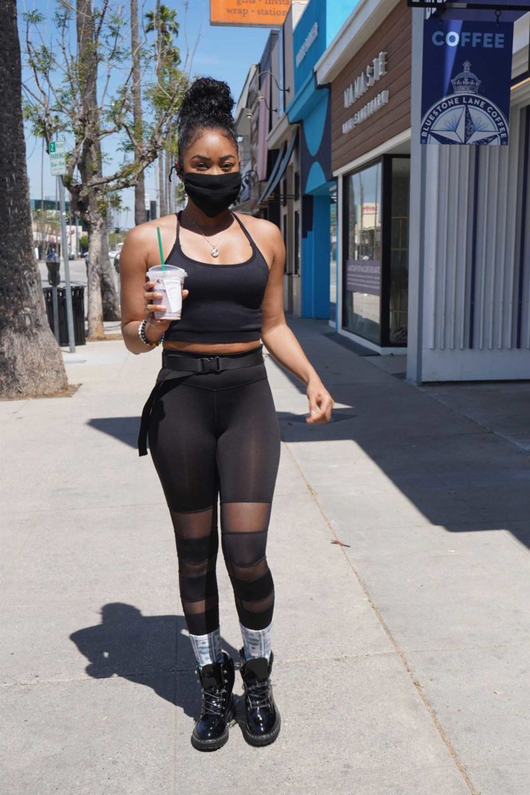 Ariane Andrew in a Black Top Stops by Starbucks with Her 
