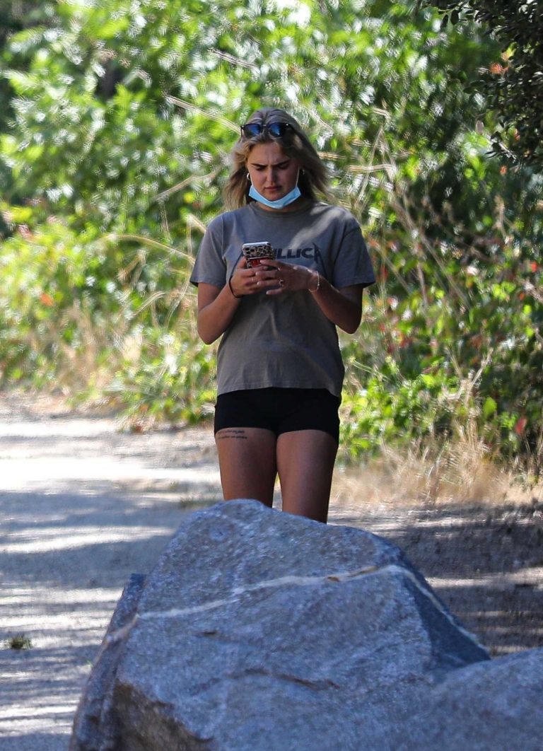 Emma Krokdal in a Gray Tee Enjoys an Early Morning Hike Out with Dolph