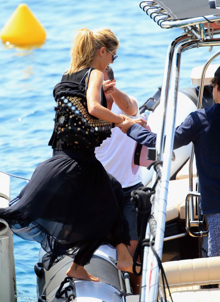 Heidi Klum Leaves Eden Roc Hotel in Cannes-3