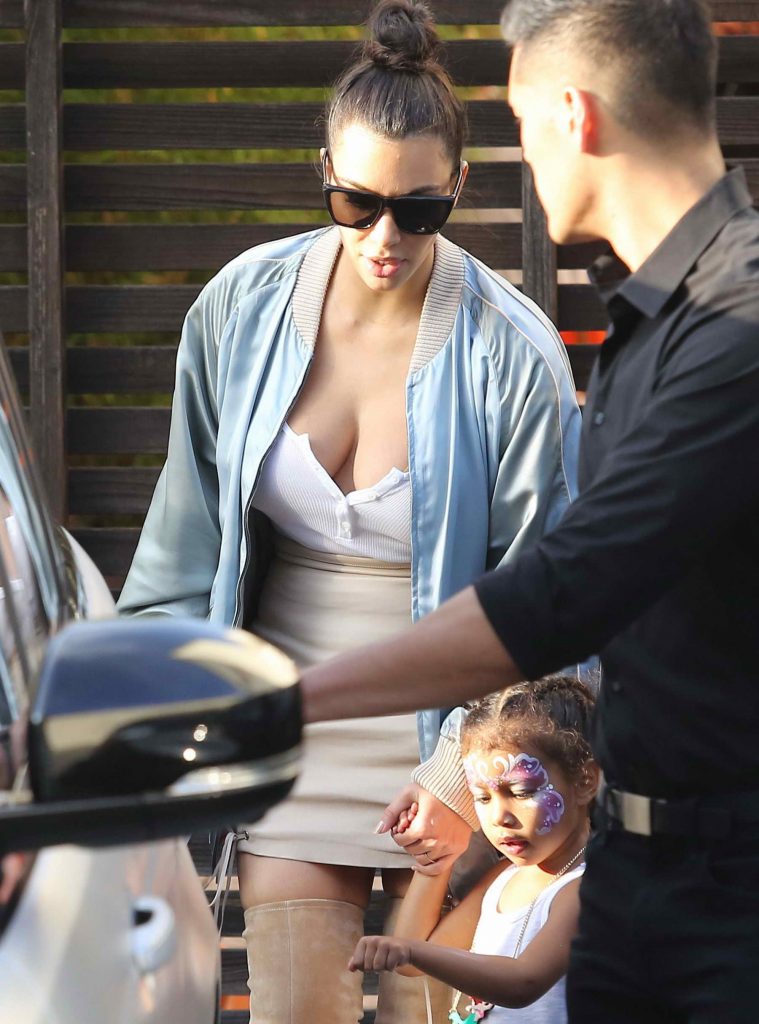 Kim Kardashian and Kourtney Kardashian Leaving a Kids' Party in Los Angeles-2