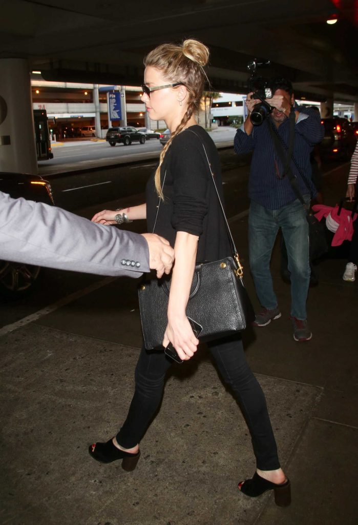 Amber Heard Arrives at LAX Airport in Los Angeles-5