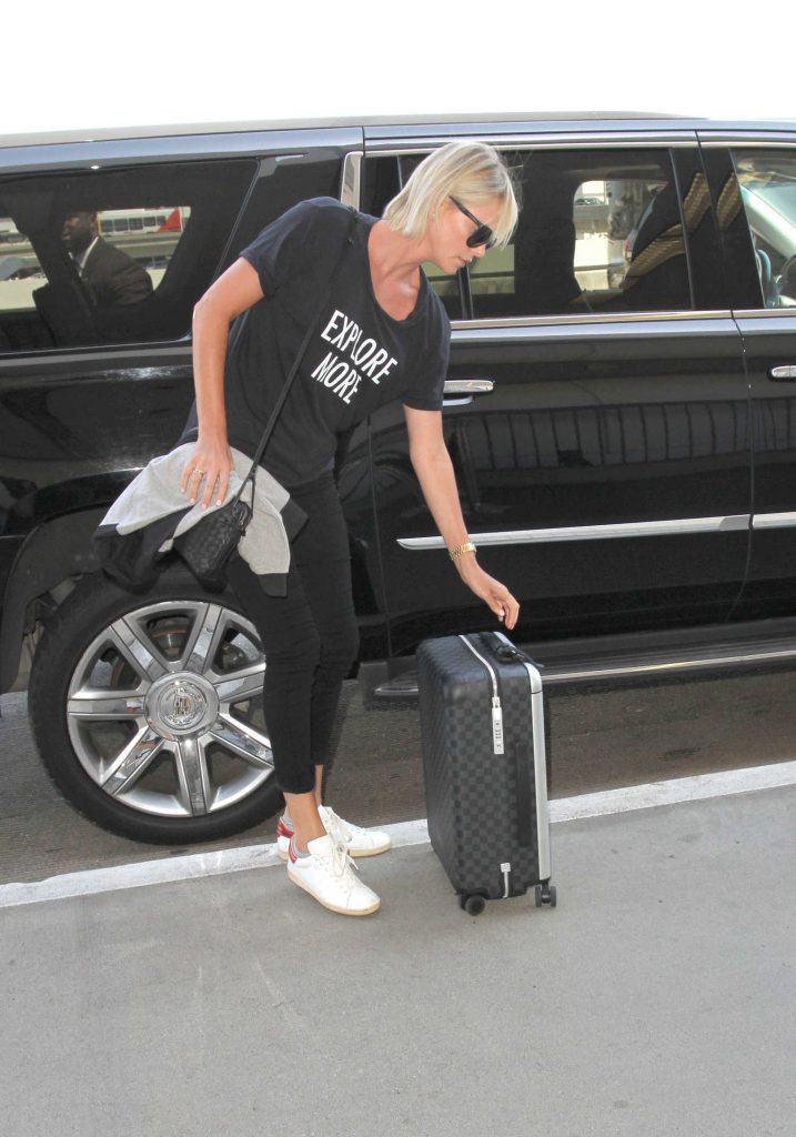 Charlize Theron Arrives at LAX Airport in Los Angeles-1