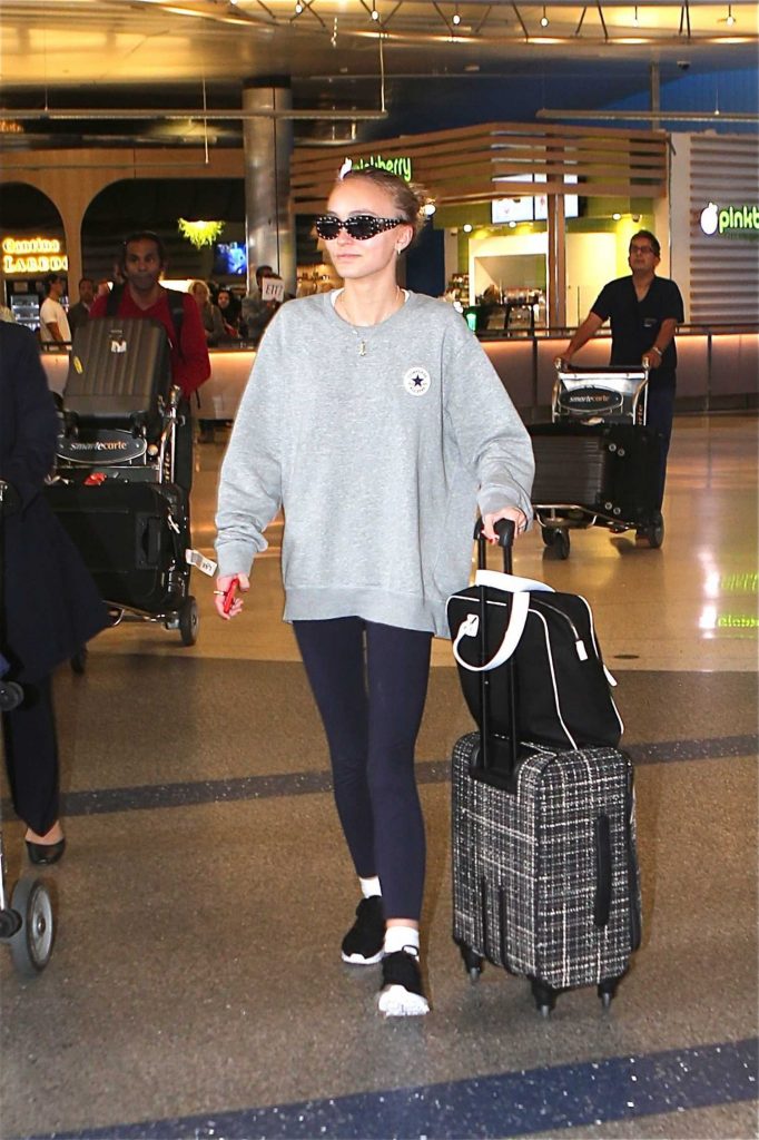 Lily Rose Depp Arrives at LAX Airport in Los Angeles-1