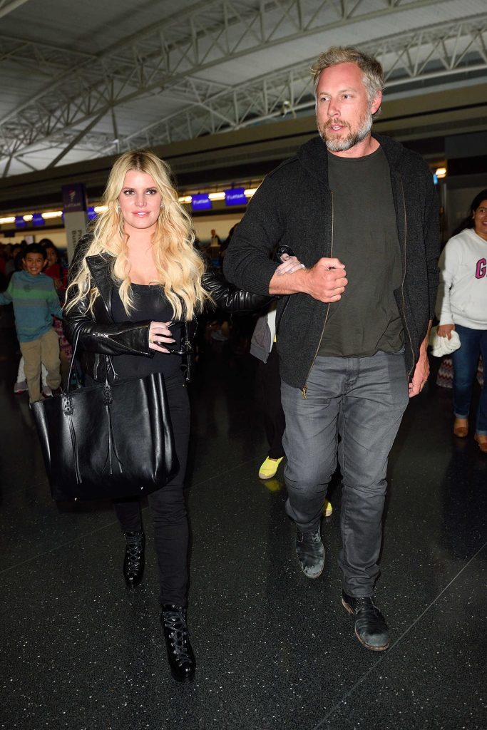Jessica Simpson Arrives at JFK Airport in NYC With Her Husband Eric Johnson-3