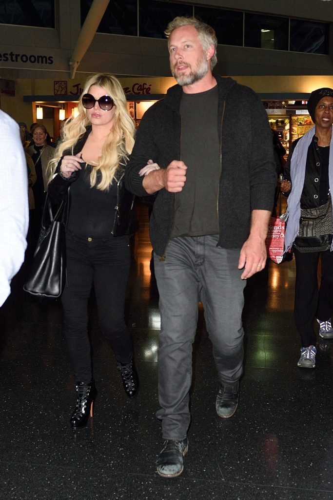 Jessica Simpson Arrives at JFK Airport in NYC With Her Husband Eric Johnson-5