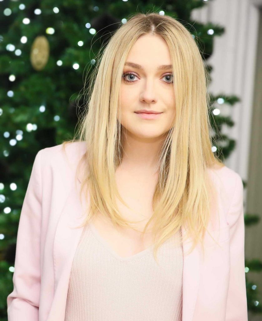 Dakota Fanning Visits a Holiday Celebration at The Line in New York-3