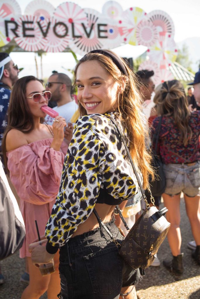 Alexis Ren Attends the REVOLVE Desert House During the Coachella Valley Music and Arts Festival in Palm Springs-5