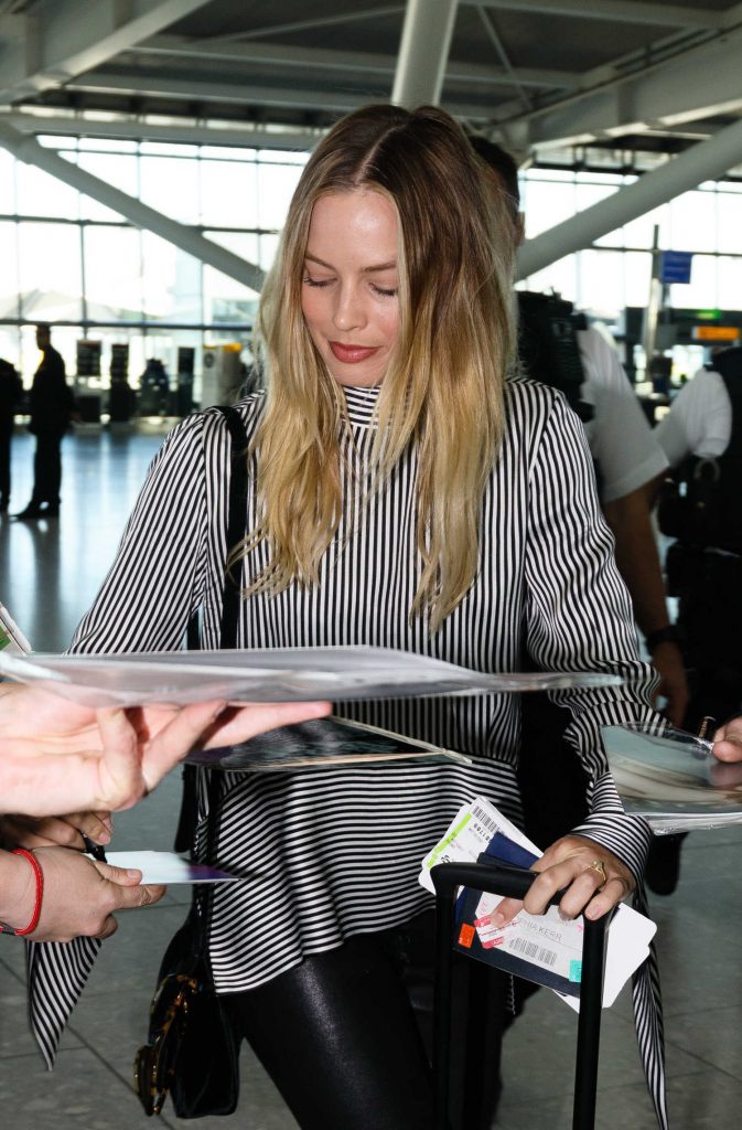 Margot Robbie at Heathrow Airport in London-3