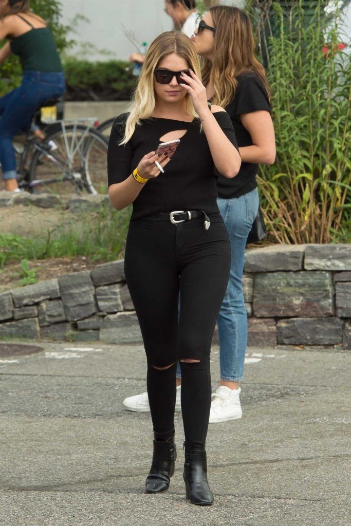 Ashley Benson Smokes a Cigarette at the Heliport in NYC-3