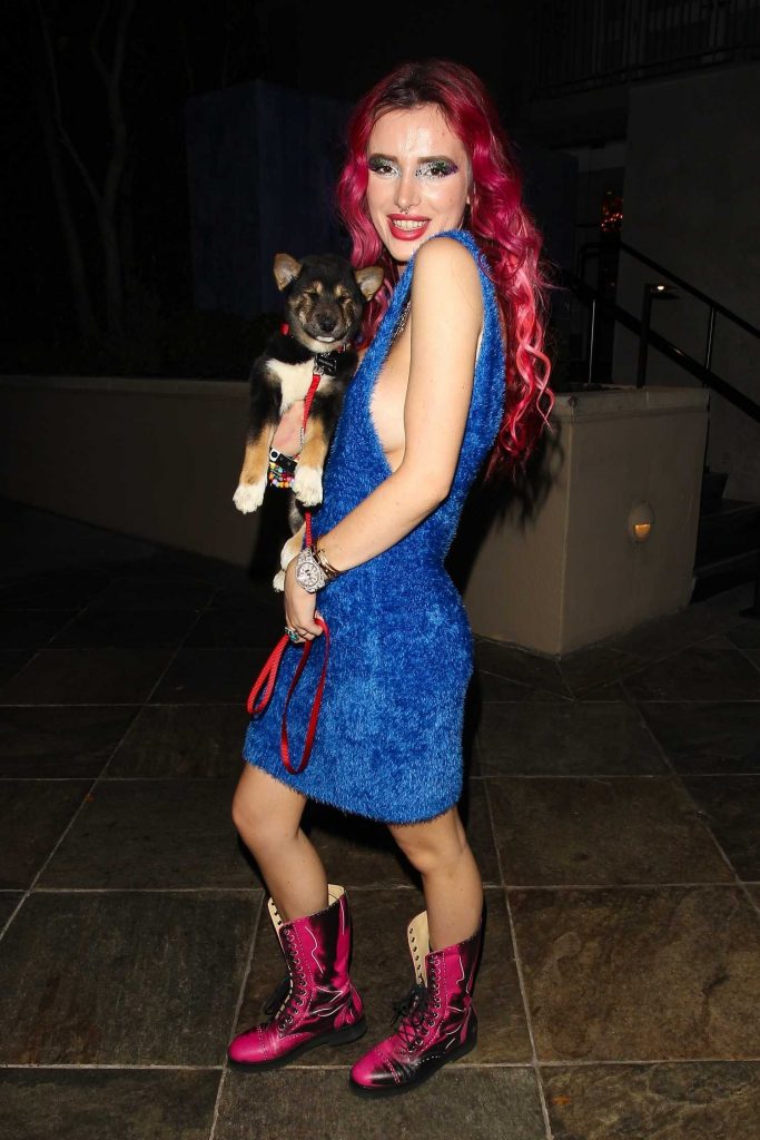 Bella Thorne Leaves the Viceroy L'Ermitage Hotel in Beverly Hills With Her New Puppy-3