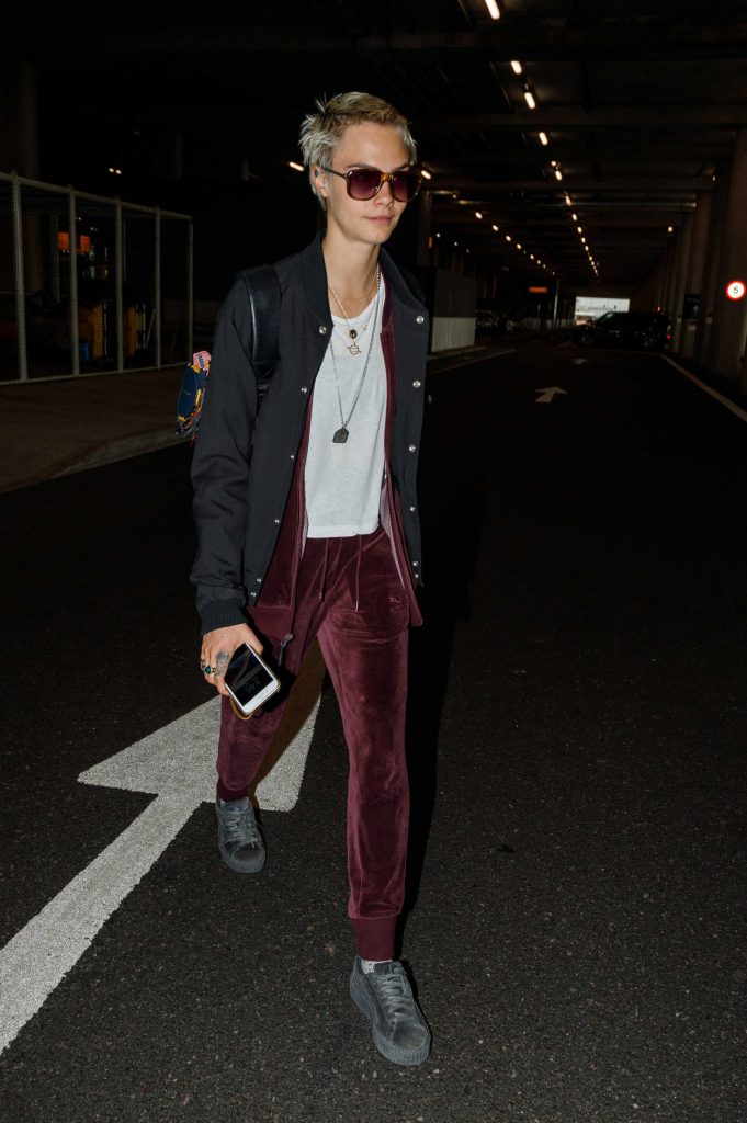 Cara Delevingne Arrives at Heathrow Airport in London-2