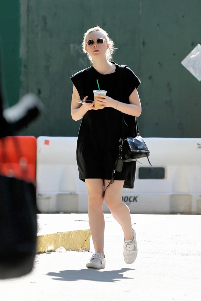 Elle Fanning Walks Home With an Iced Coffee in NYC-3