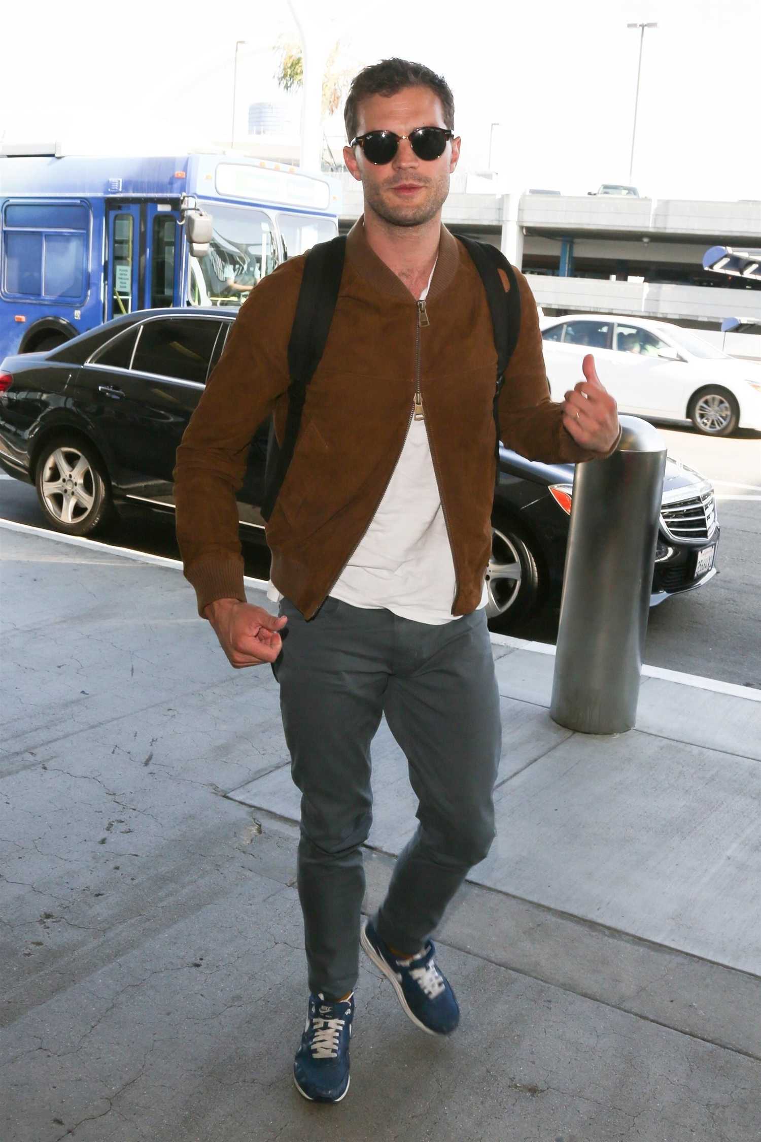Jamie Dornan Arrives at LAX Airport in LA – Celeb Donut