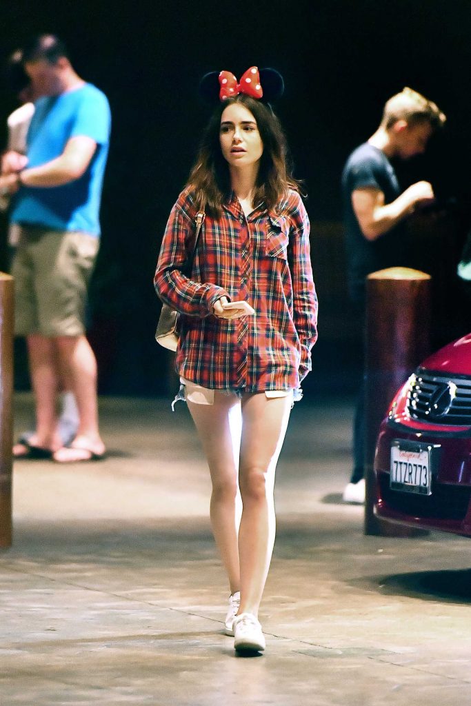 Lily Collins Wears Minnie Mouse Ears While Visiting Disneyland in Anaheim-2