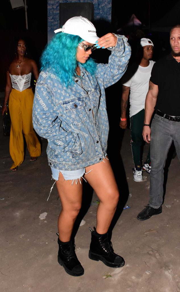 Rihanna Wears a Turquoise Wig at a Carnival in Barbados-4