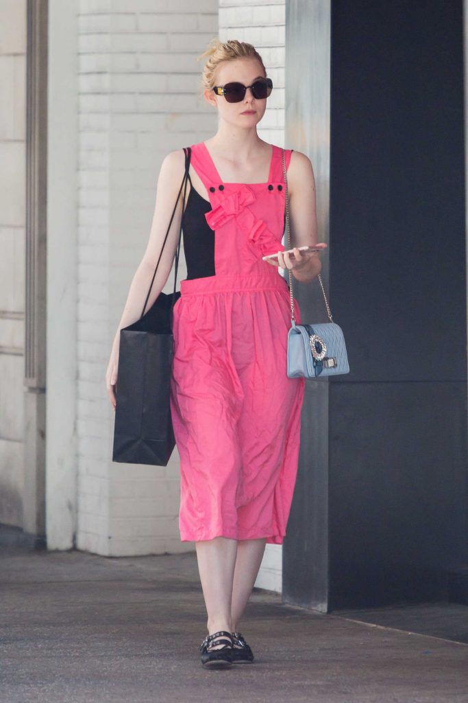 Elle Fanning Goes Shopping at Barney's in NYC-3