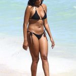 Claudia Jordan Wears a Black Bikini at the Beach in Miami