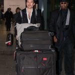 Ezra Miller Arrives at Heathrow Airport in London