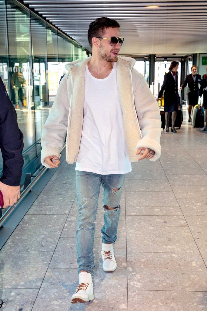 Liam Payne Arrives at Heathrow Airport in London-4