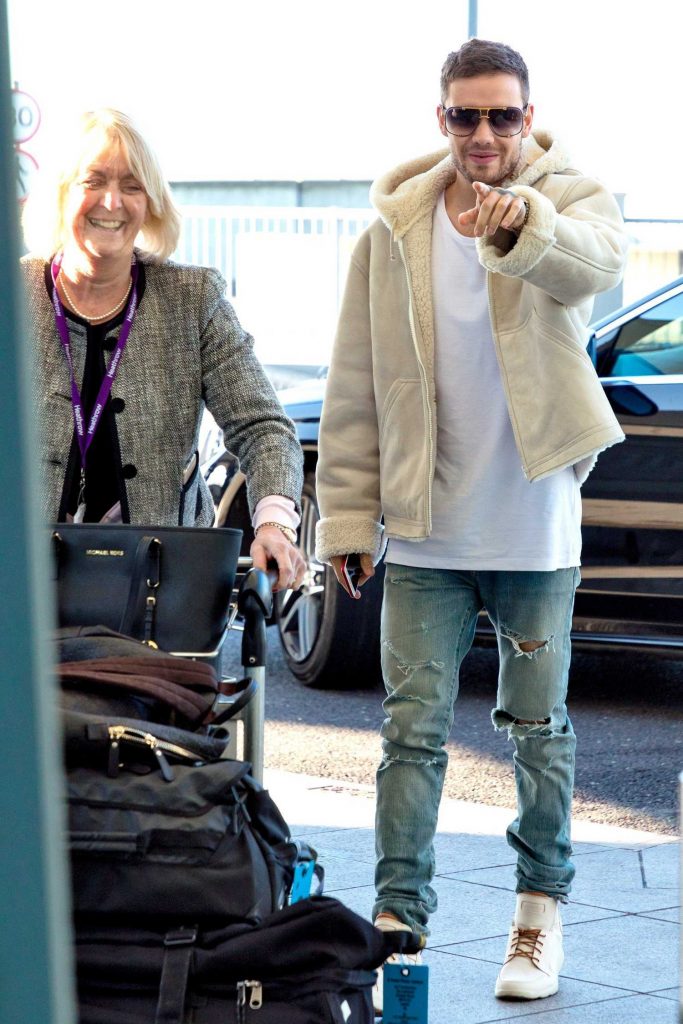 Liam Payne Arrives at Heathrow Airport in London-5