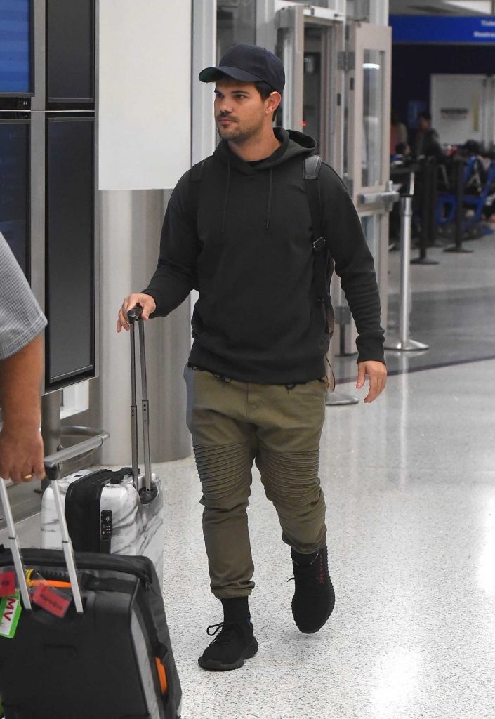 Taylor Lautner Was Seen at LAX Airport in LA-1