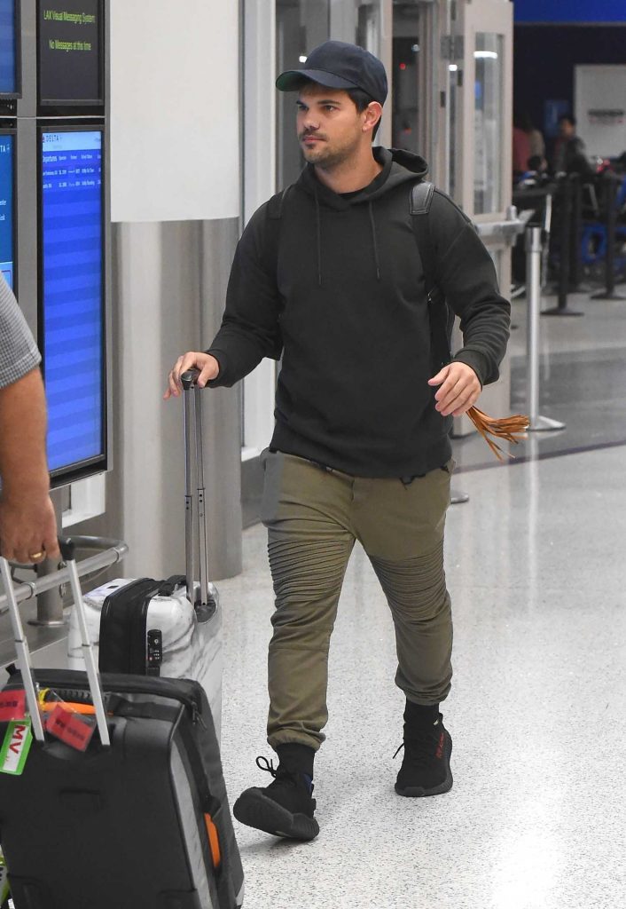 Taylor Lautner Was Seen at LAX Airport in LA-2