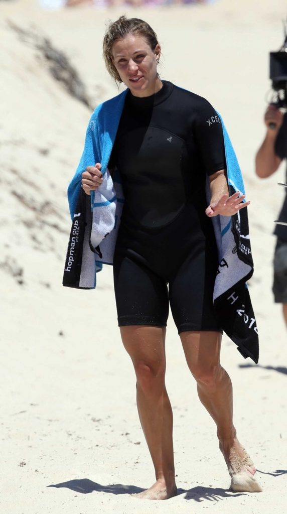 Angelique Kerber Takes Surfing Lesson at Trigg Beach in Perth, Australia-5