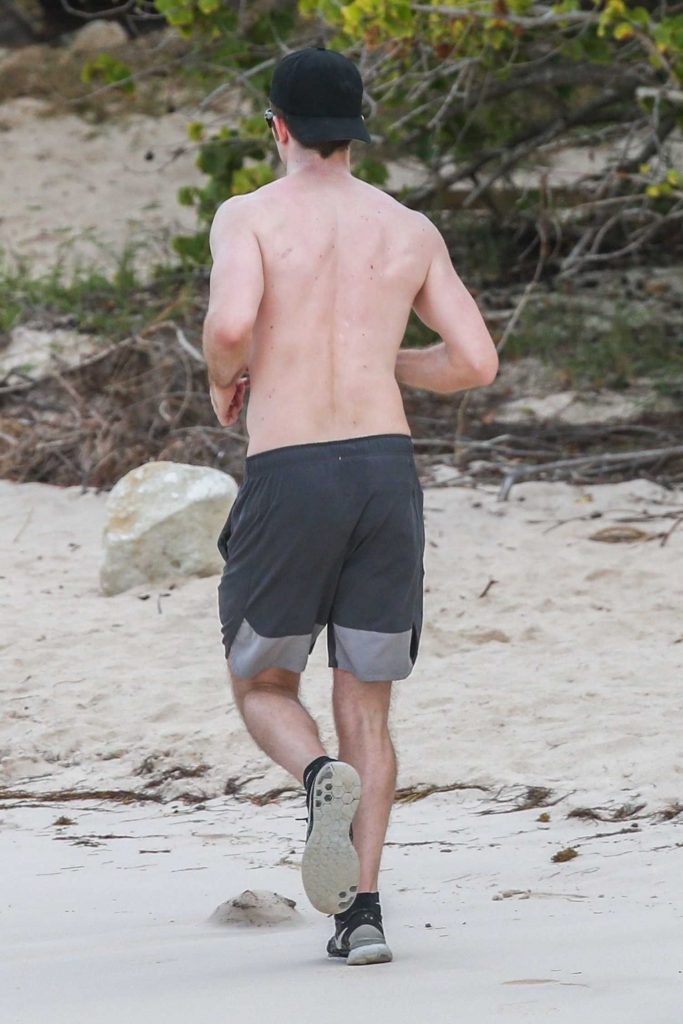 Robert Pattinson Works Out on the Beach in Antigua-4
