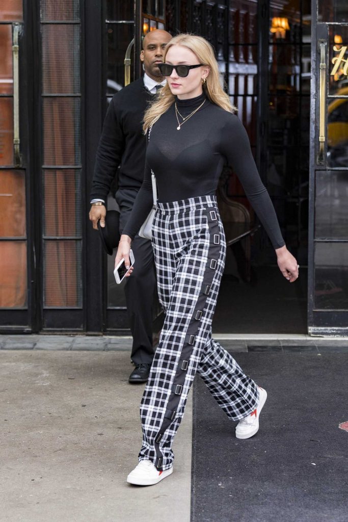 Sophie Turner Heads Out in New York City in a Sheer Black Top-1