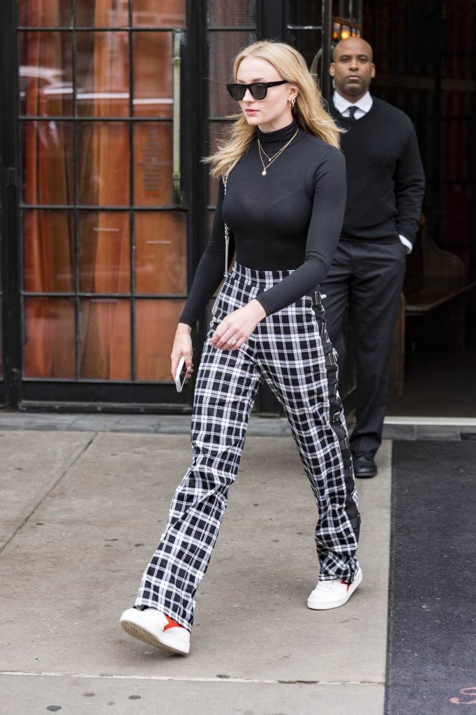 Sophie Turner Heads Out in New York City in a Sheer Black Top-3