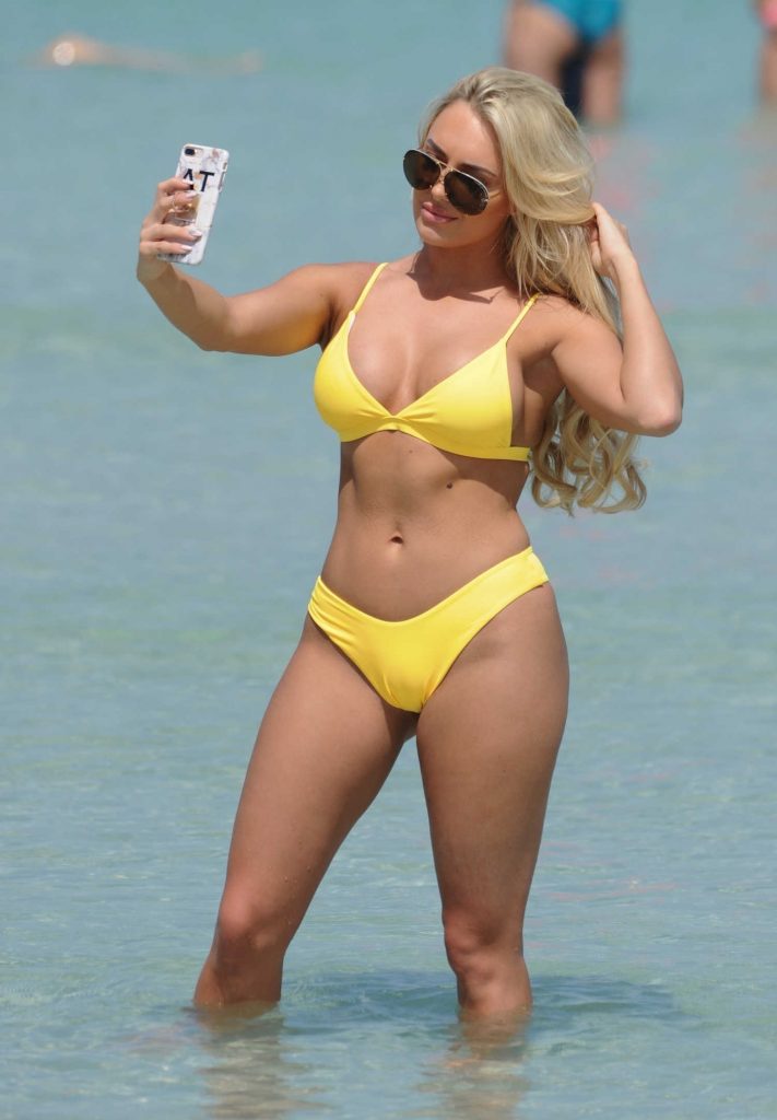 Amber Turner Wears a Yellow Bikini on the Beach in Dubai-5