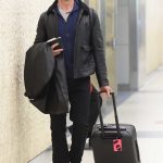 Hugh Jackman Wears a Black Leather Jacket at JFK Airport in NYC