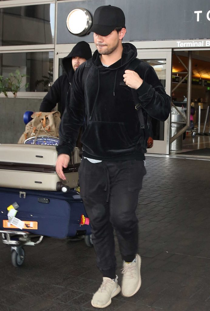 Taylor Lautner Arrives at LAX Airport in LA-2