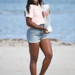 Sloane Stephens Poses with the Championship Trophy on Crandon Beach in Miami