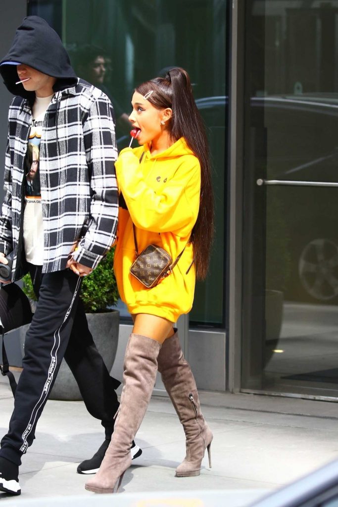 Ariana Grande Wears a Yellow Hoody Out in NYC-1