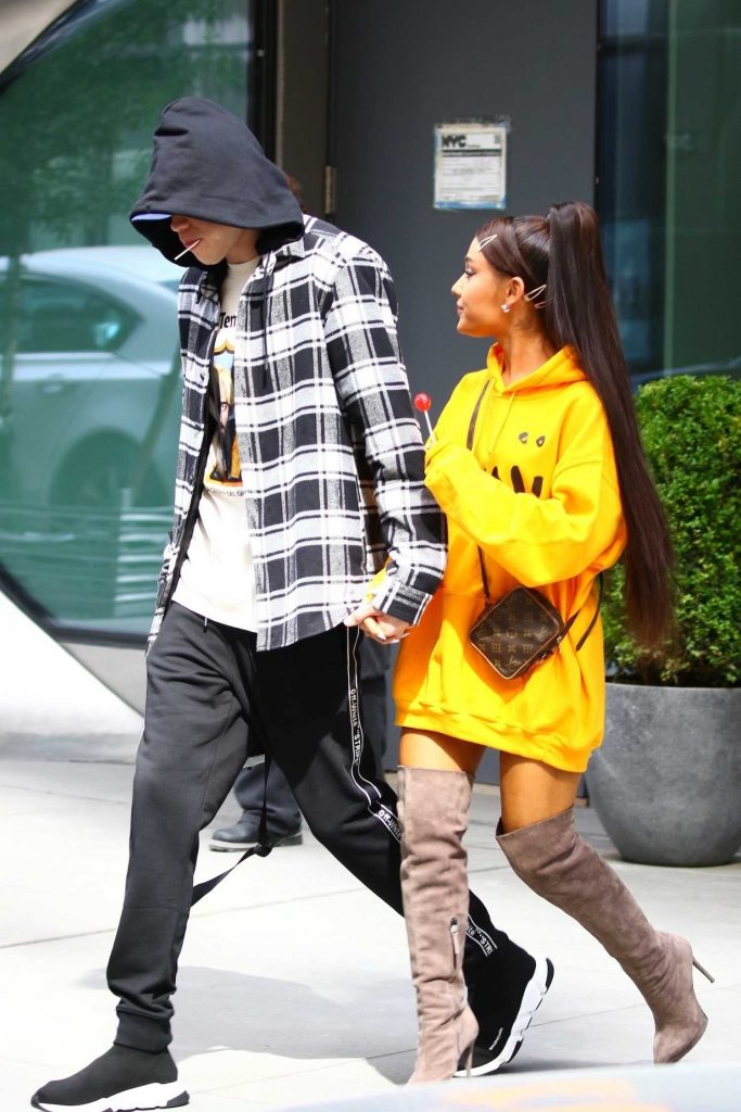 Ariana Grande Wears a Yellow Hoody Out in NYC-2