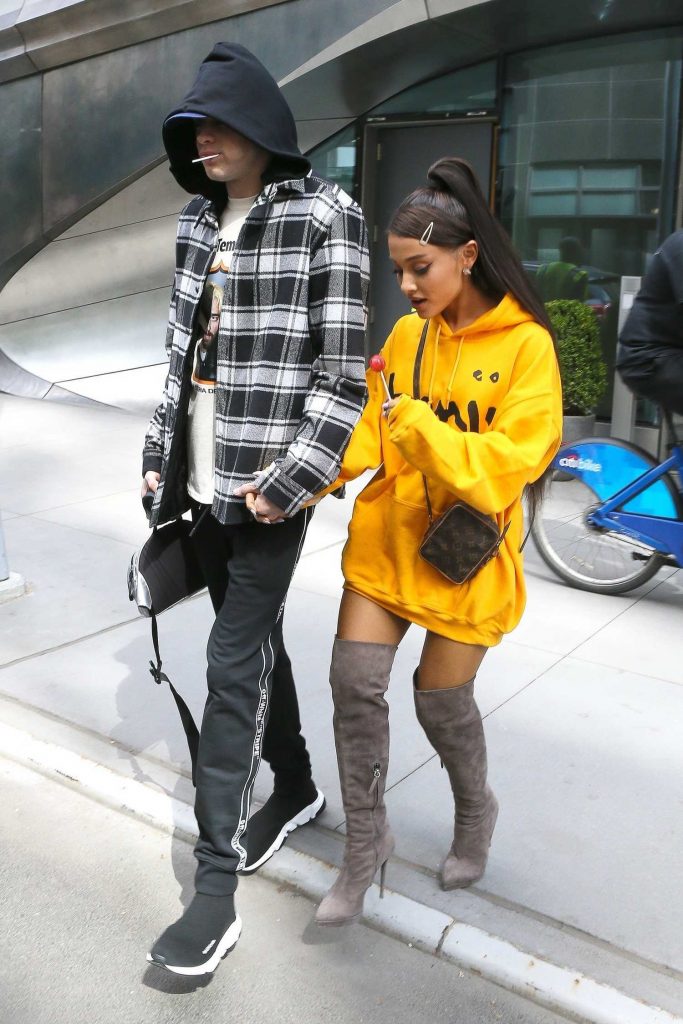 Ariana Grande Wears a Yellow Hoody Out in NYC-3