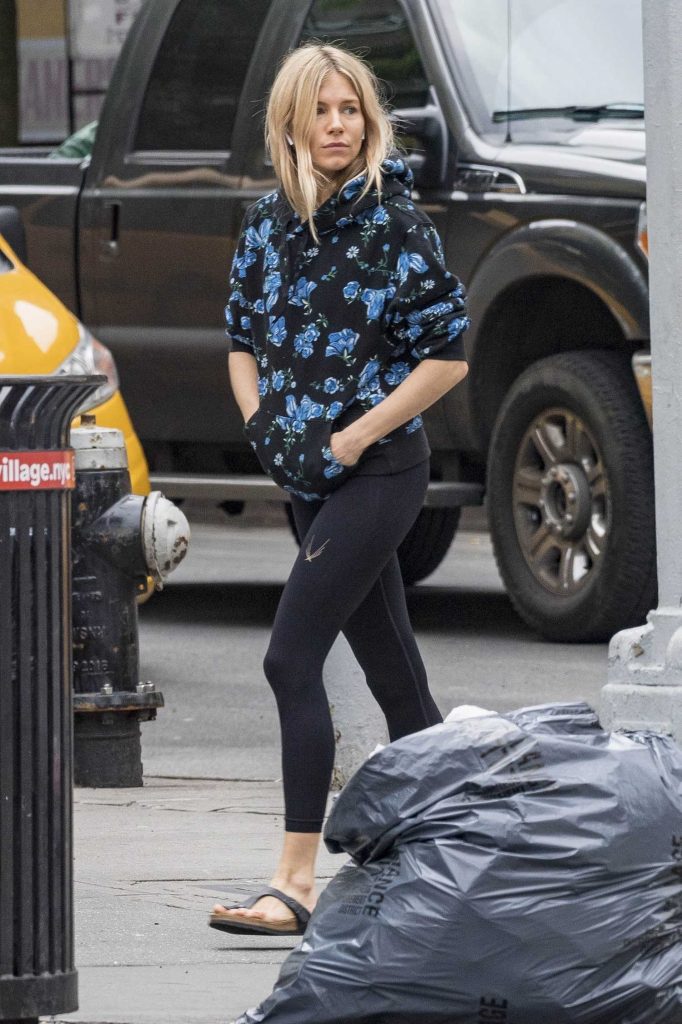 Sienna Miller Wears a Floral Print Hoodie Out in New York City-1