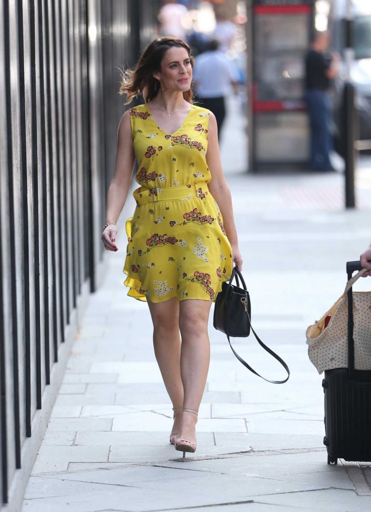Susie Amy in a Short Yellow Dress
