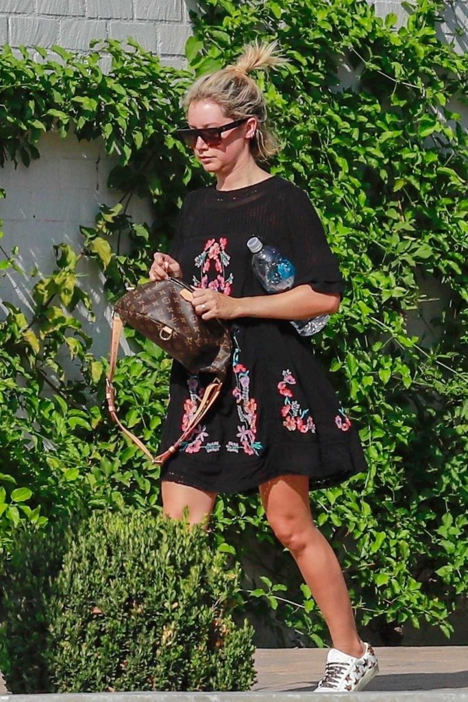Ashley Tisdale in a Black Floral Dress