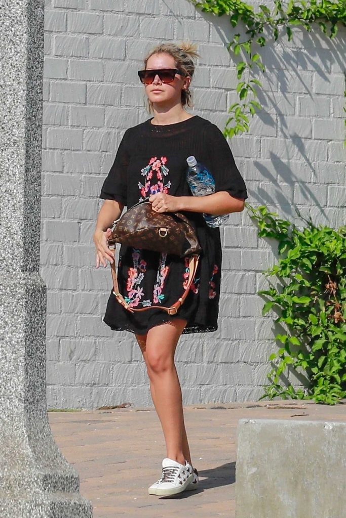 Ashley Tisdale in a Black Floral Dress