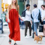 Martha Hunt in a Red Sundress Walks Her Dog Bear in NYC