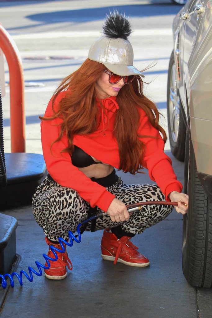 Phoebe Price in a Red Cropped Hoody