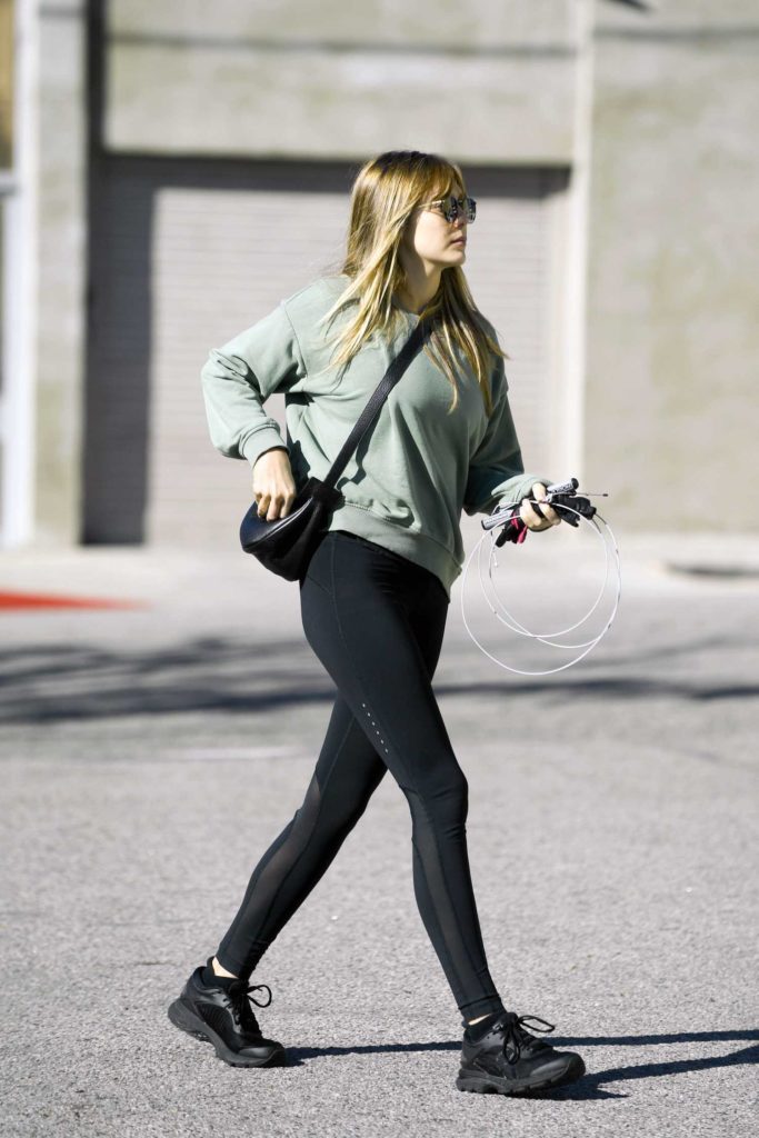 Elizabeth Olsen in a Black Leggings