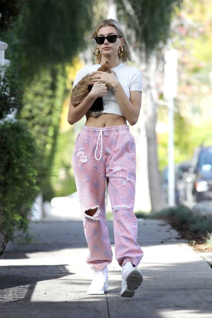 Hailey Baldwin in a Pink Ripped Sweatpants