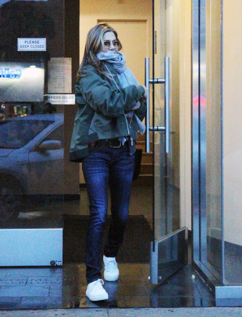 Jennifer Aniston in a Green Jacket