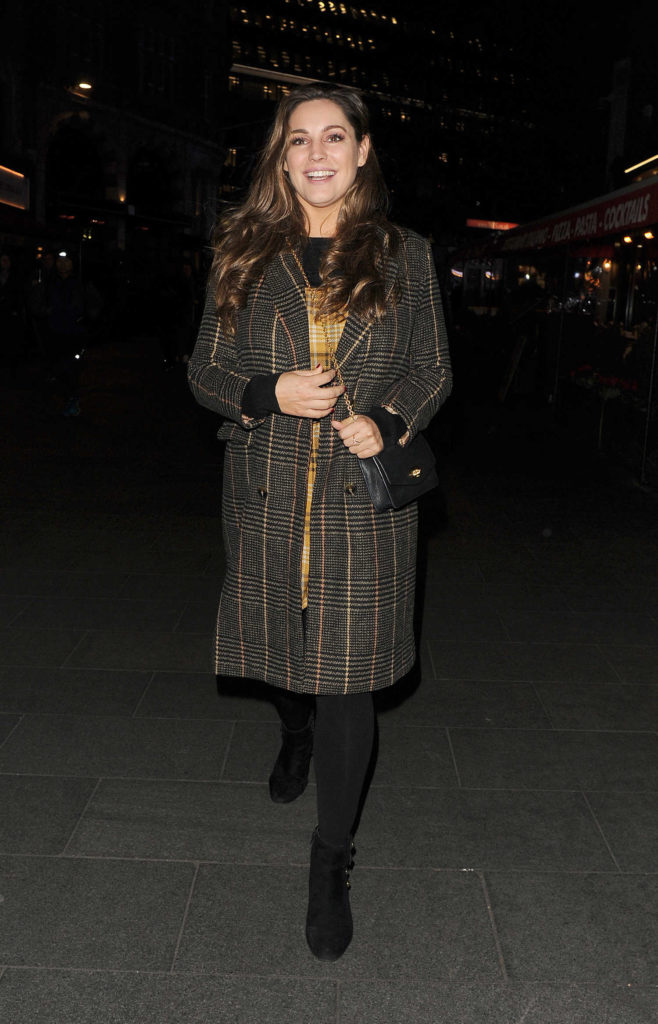 Kelly Brook in a Plaid Coat