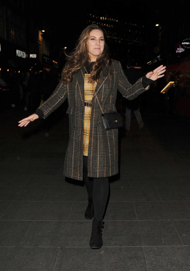 Kelly Brook in a Plaid Coat